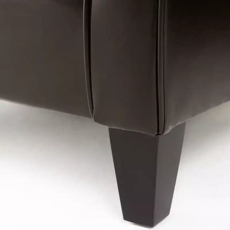 Fauteuil club contemporain rembourré à accoudoirs roulés