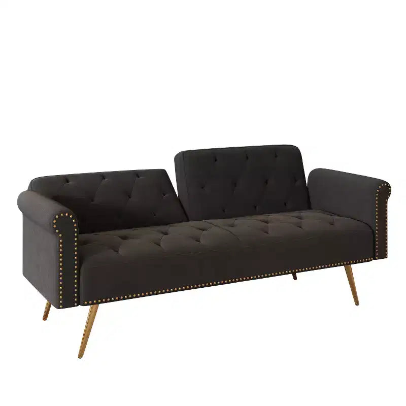 Canapé en velours noir avec clous décoratifs et coussin assorti