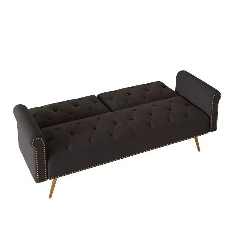 Canapé en velours noir avec clous décoratifs et coussin assorti
